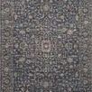 Sorrento Midnight / Natural traditional area rug with intricate faded vintage-style pattern in blue and beige hues