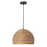 Pendant light illuminated, revealing warm glow through woven shade