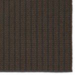 Close-up top view focusing on linear striped weave texture in alternating gray and brown fibers