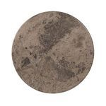 Top-down view of circular light grey marble tabletop displaying natural stone patterns
