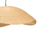 Side perspective showing the pendant’s curved edge and woven texture in detail