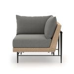 Three-quarter side view with light gray cushions showing cushion thickness and frame structure