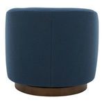 Back view showing uninterrupted deep blue fabric and rounded edges over brass swivel base