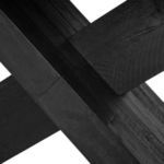 Close-up of the durable dark wood crossbeam showing texture and intersecting angles