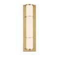 Close-up of brass metal plate and glass tube connection on Blaine bath wall sconce