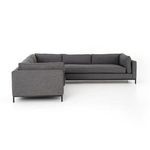 Opposite side profile of sectional showing linear silhouette and black metal legs