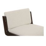 Close detail of chair back and seat edges with visible upholstery texture and frame curve