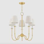 Amina Chandelier in a simple white room setting showing scale and fixture height