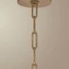 Upward view of the Patina Brass ceiling mount and chain links securing the Keats pendant