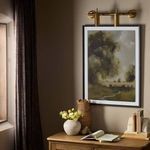 Albi Double Sconce mounted above framed landscape painting in warm-toned room