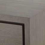 Close-up corner detail showing the layered wood grain and smooth finish on the top edge