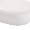 Close-up on rounded edge of white pebble coffee table highlighting seamless smooth matte concrete texture