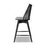 Side profile of Lewis Swivel Stool highlighting chair height and seat thickness