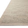 Side angle showing the rug’s two-level pile and thin binding edge