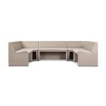 U-shaped outdoor dining banquette in vintage white rattan with soft-lined frame and cushioned seats