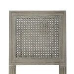 Detailed close-up of hand-woven cane back panel framed in cerused oak on Annette Counter Stool