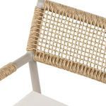 Close-up detail of woven rope backrest with frame connection points