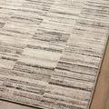 Angled close-up of Darby Charcoal Sand Rug displaying detailed ribbed pattern and neutral tones