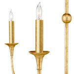 Detailed view of lit candle bulb and thin gold arm curving outward