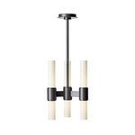 Dixon Pendant illuminated showing warm glow through opal white glass pillars