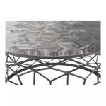 Close-up side view showing the thickness of the stone tabletop and metal lattice connection