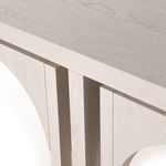 Perspective shot from low angle showing multiple arches and layered nesting tables underneath
