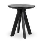 Rodrigo table showing four angled legs joined underneath round top