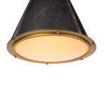 Close-up bottom lit diffuser shade with brass ring and circular studs