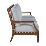 Side profile showing armrest curve and slatted wooden base beneath cushions