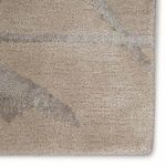 Extreme close-up of rug surface showing viscose and wool texture and intricate abstract line pattern