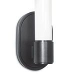 Close-up showing lower cylindrical dark metal base of Dixon Single Sconce with oval backplate