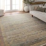 Traditional rug displayed in bright living room with neutral furniture and natural lighting