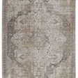 Vintage style rug with distressed medallion pattern in gray, ivory, tan, and taupe hues