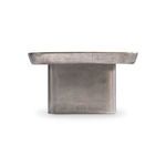 Back view of the table emphasizing the cylindrical base and even thickness of the tabletop