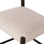 Close-up of textured cotton-linen blend upholstery on stool seat