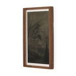 Side view showing walnut frame depth and thickness around moody landscape painting