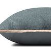 Side profile showing pillow's rounded shape and smooth darker gray backing fabric