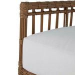 Close-up on white cushion fabric and clean stitching on chair seat