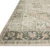Close-up angled view showing low pile texture and border detailing of Skye Natural Sand Rug