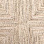 Close-up of vintage white woven seat, showing texture and pattern