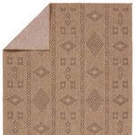 Sahel rug corner folded to show flatwoven underside texture and pattern articulation