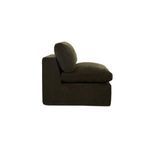 Side view of Cates Slipper Chair illustrating thick cushioned profile and straight back