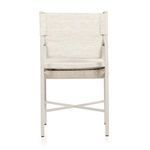 Rear view of chair showing slightly rounded top and clearly woven wicker material