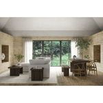 Monterey Bench shown in rustic dining room with wooden walls, large windows, and natural décor