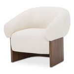 Otto accent chair angled front view showing curved arm and walnut veneer sides