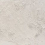 Close-up of textured off-white concrete surface showing natural variances and finish