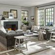 Living room scene with cocktail table placed on light rug among dark sofas and armchairs