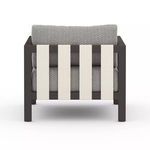 Rear view of Sonoma Faye Ash Outdoor Chair with four vertical neutral back straps over dark frame