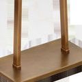Close-up of rectangular antique brass base with two supporting metal bars attached