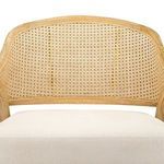 Close-up of Edward Lounge Chair backrest cane weaving over cream cushion